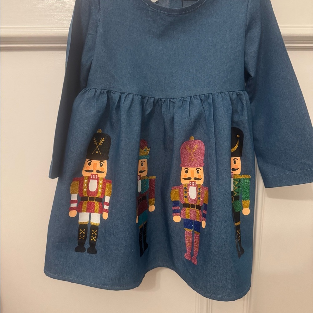 Blue Dress with Nutcracker Design